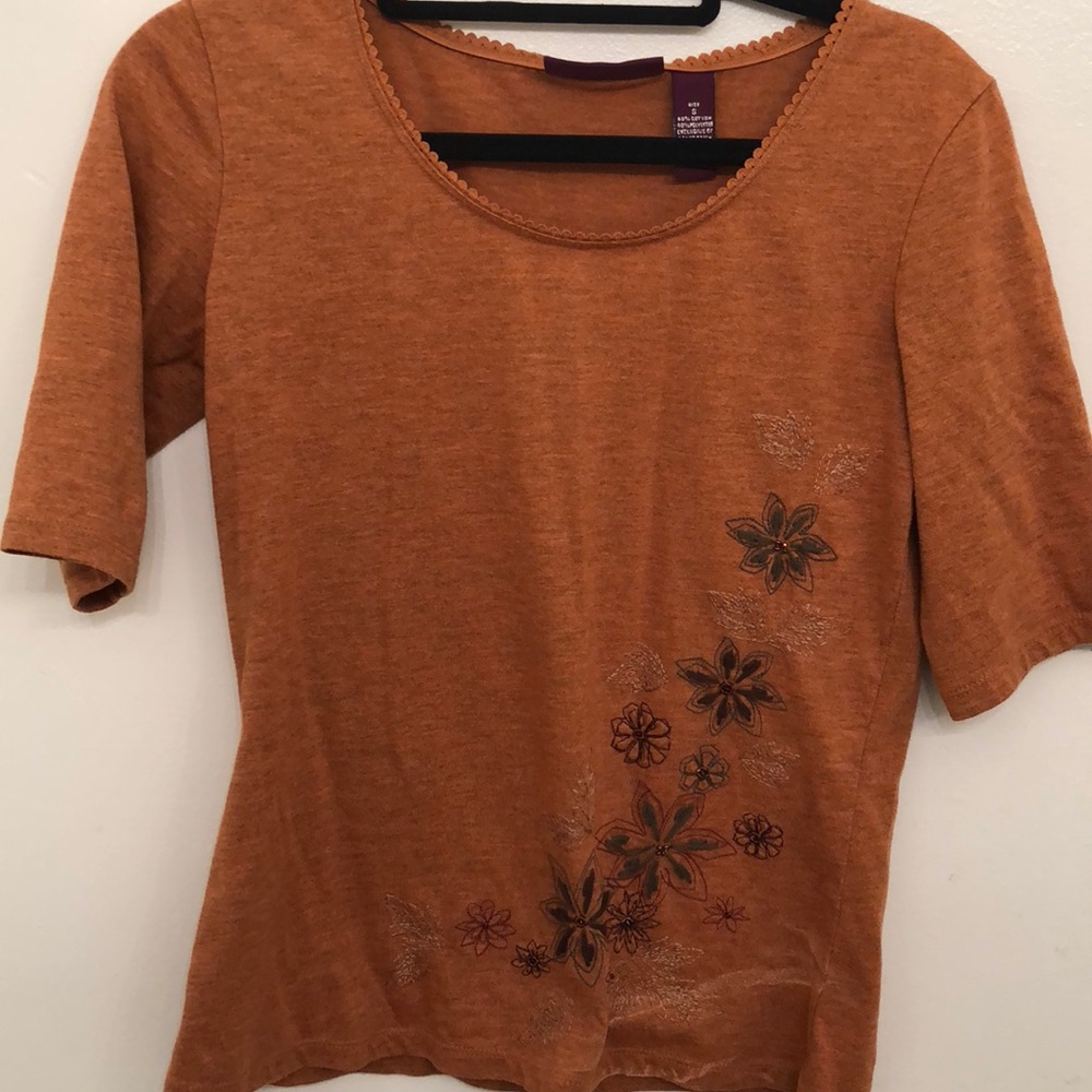 Rust-colored too with flower stitching